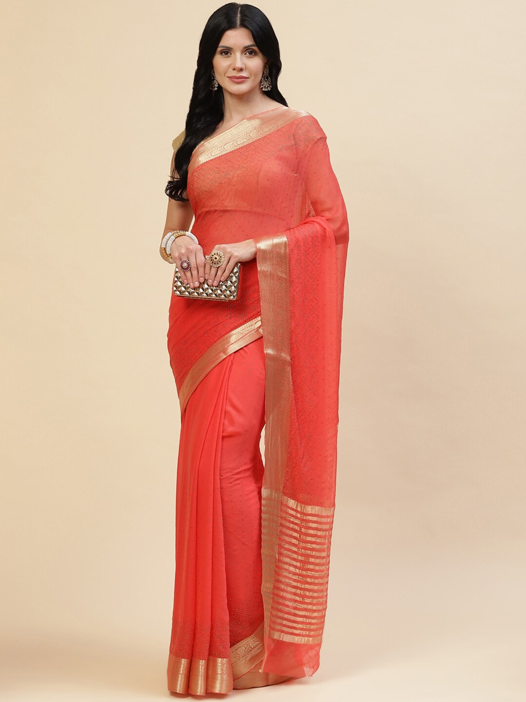 

Meena Bazaar Peach-Coloured & Gold-Toned Embellished Saree