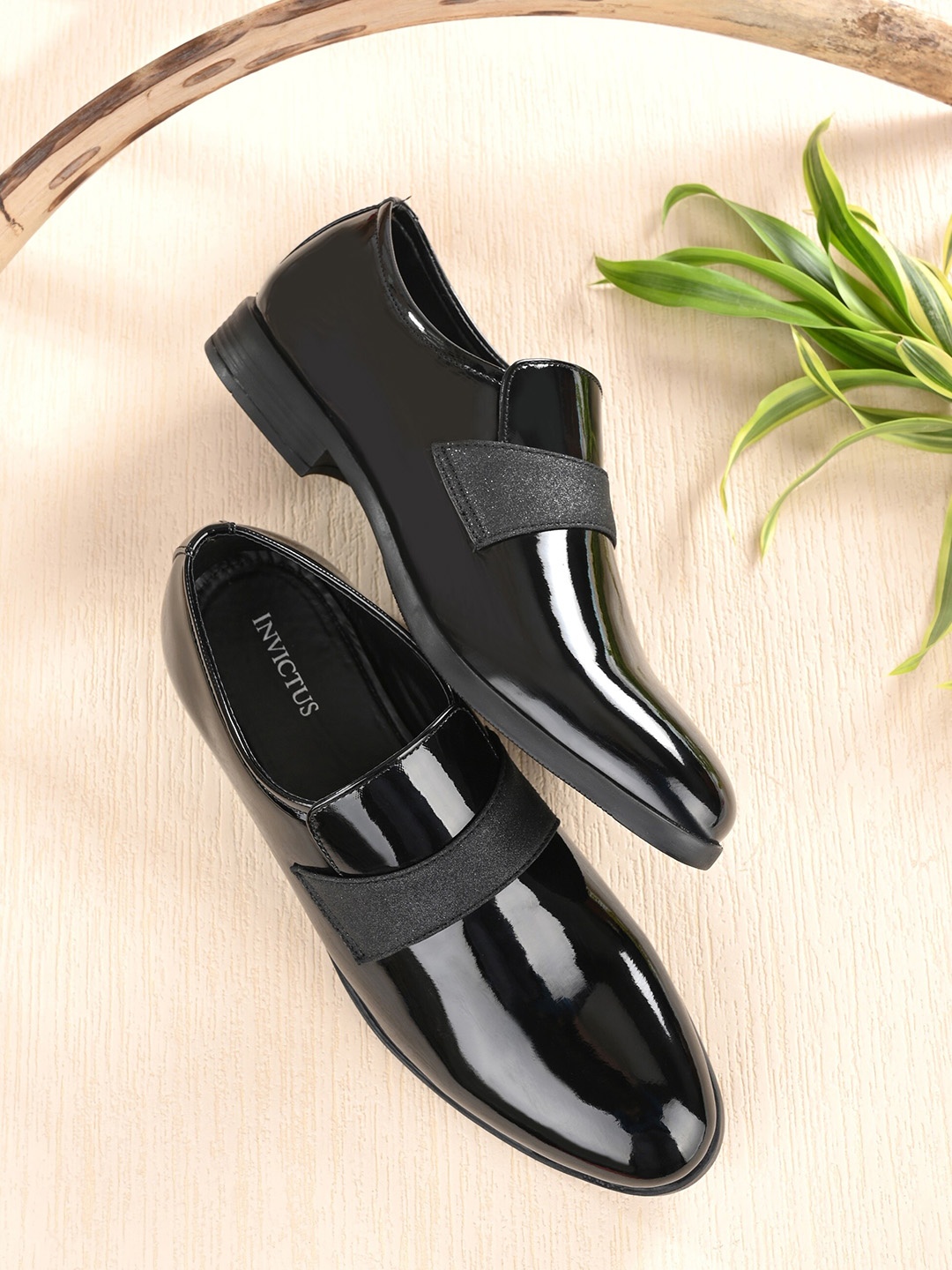 

INVICTUS Men Black Solid Synthetic Leather Formal Slip-on Shoes