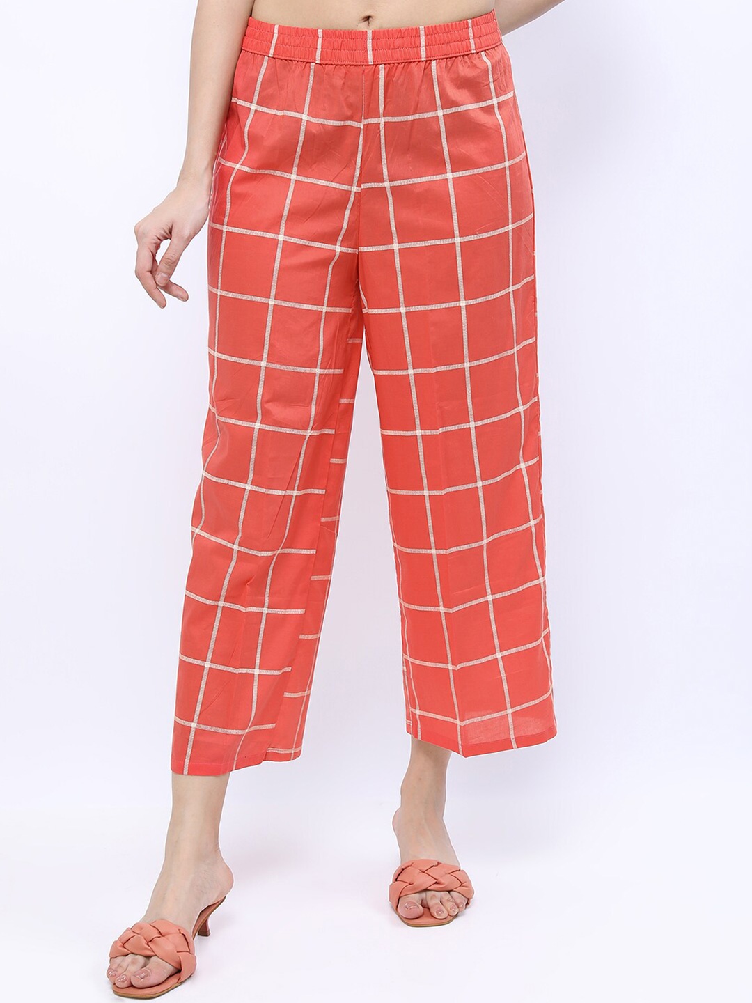 

Vishudh Women Orange & White Ethnic Motifs Checked Palazzos