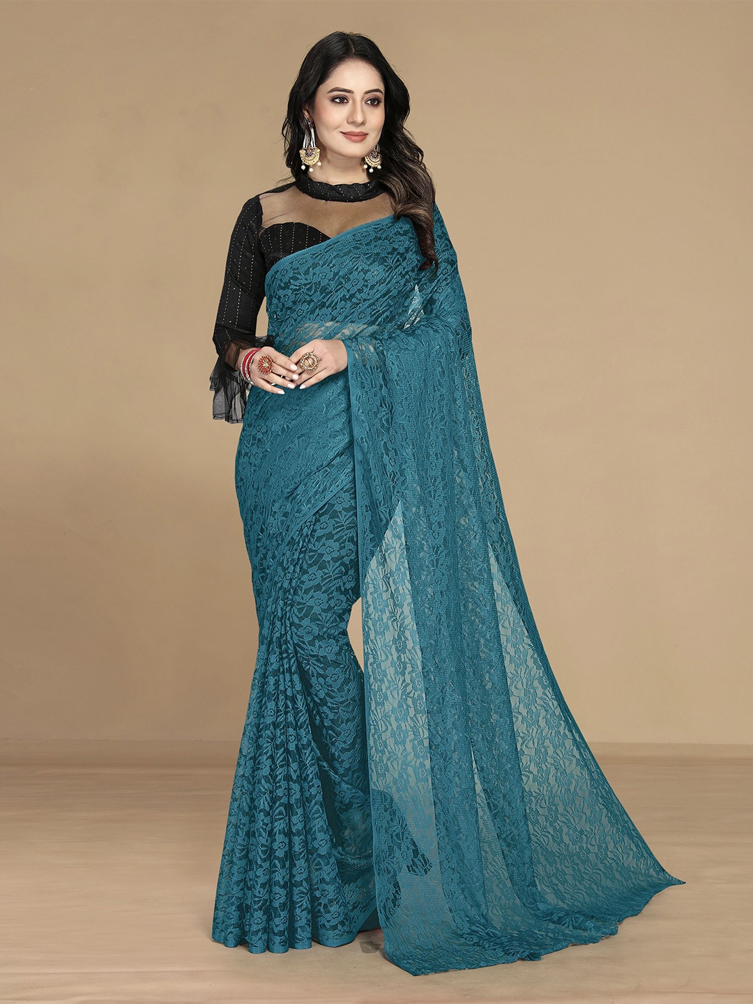 

KALINI Teal Floral Printed Net Saree With Unstitched Blouse Piece