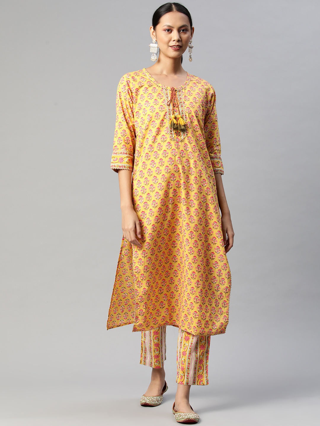 

Readiprint Fashions Women Yellow Floral Printed Gotta Patti Pure Cotton Kurta with Palazzos