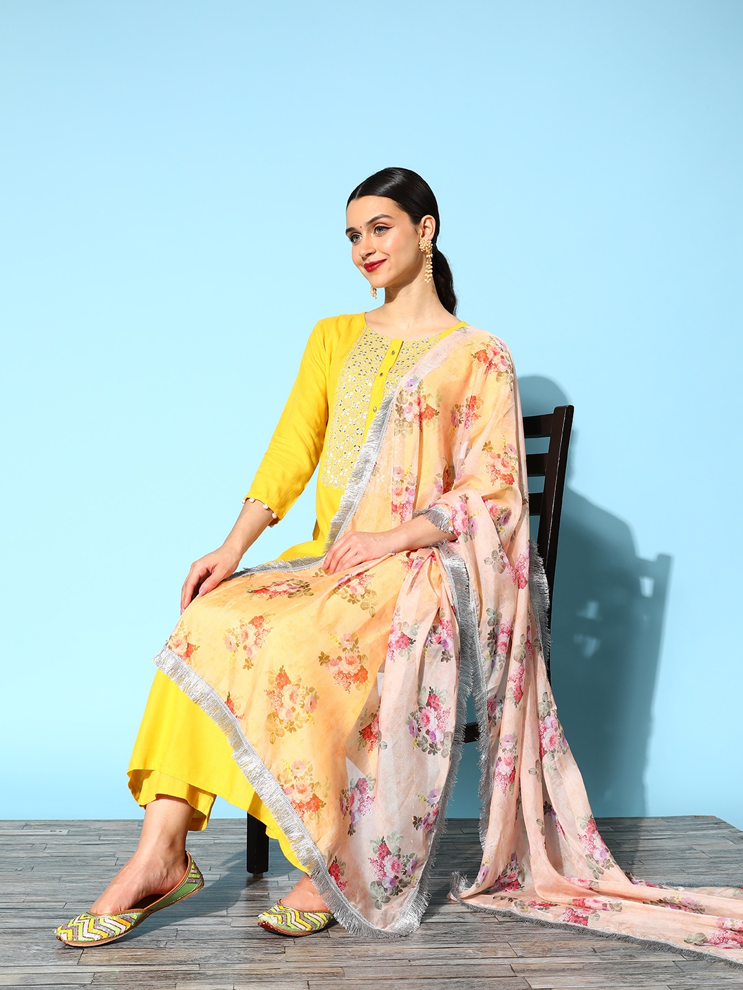 

Varanga Women Solid Viscose Rayon Hyper Texture Kurta Set, Yellow