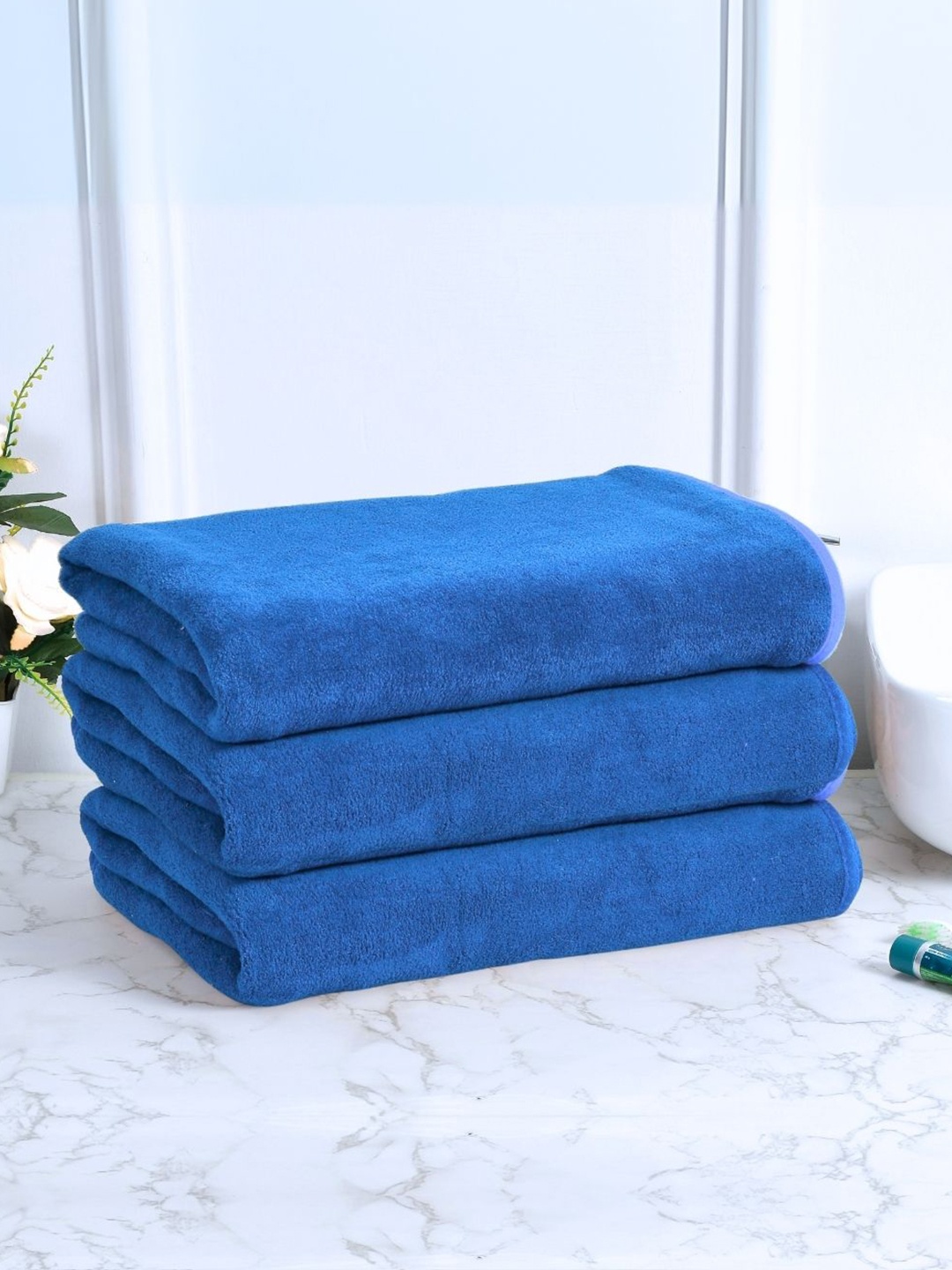 

Black gold Set Of 3 Blue Solid 400 GSM Microfiber Bath Towels