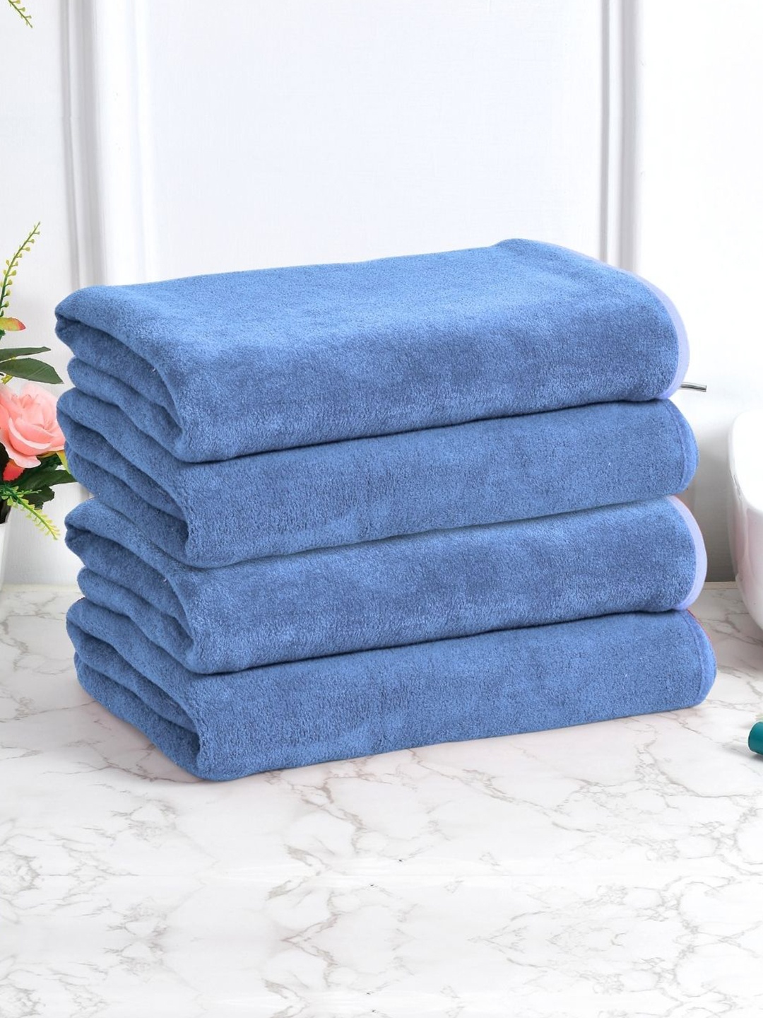 

Black gold Set Of 4 Blue Solid 400 GSM Microfiber Bath Towels