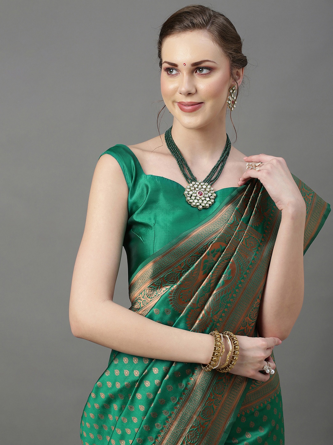 

Mitera Women Green & Gold Ethnic Motifs Woven Design Zari Silk Blend Banarasi Saree