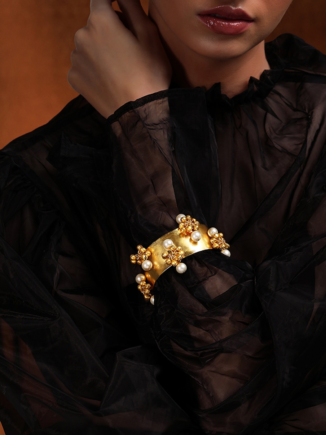 

Rubans Women Gold-Toned & White Brass Handcrafted Gold-Plated Bangle-Style Bracelet