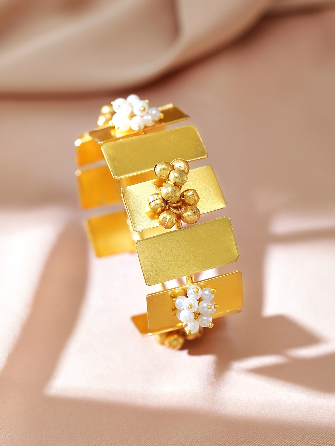 

Rubans Women Gold-Toned & White Brass Handcrafted Gold-Plated Bangle-Style Bracelet