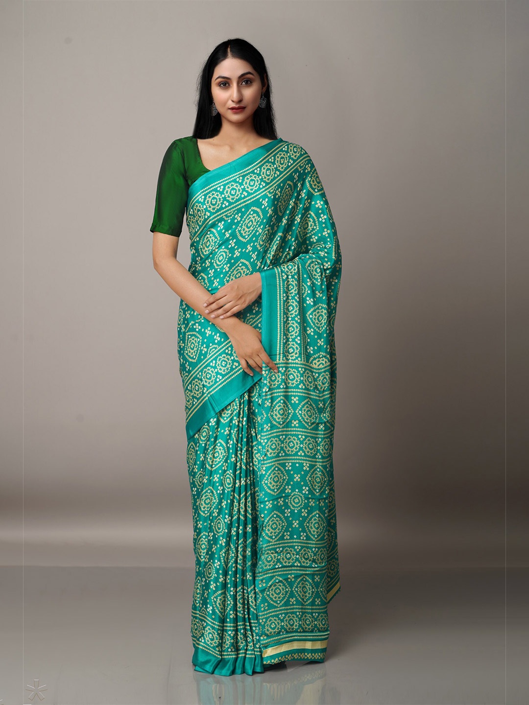 

Unnati Silks Green & Beige Bandhani Printed Saree