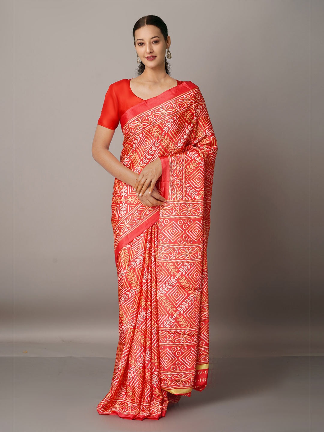 

Unnati Silks Pink & Off White Bandhani Printed Saree