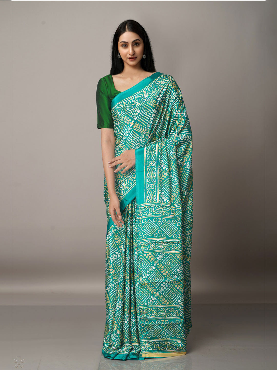 

Unnati Silks Green & Off White Bandhani Saree