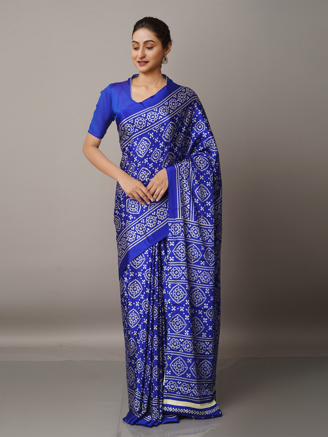 

Unnati Silks Blue & White Bandhani Saree