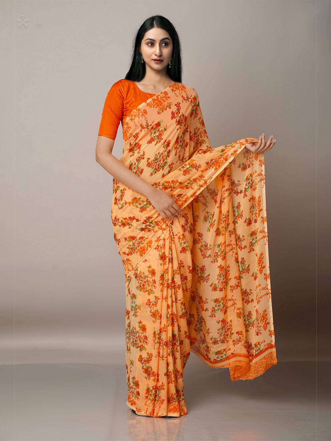 

Unnati Silks Orange & White Ethnic Motifs Block Print Saree