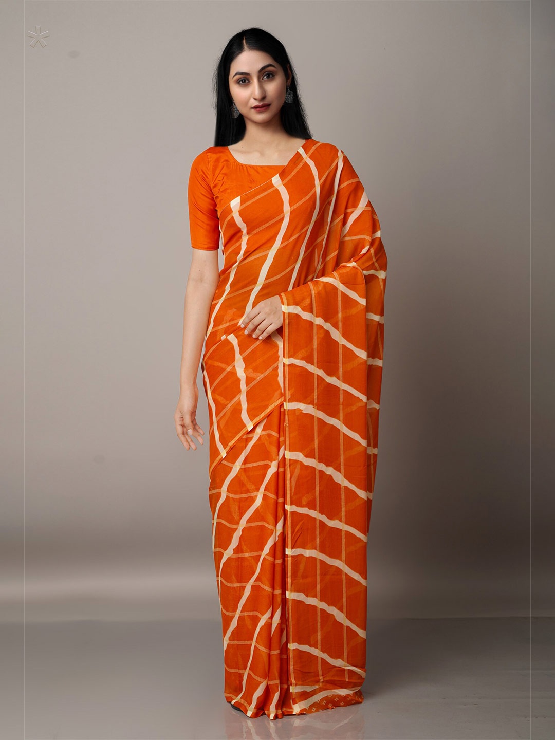 

Unnati Silks Orange & Off White Checked Block Print Saree