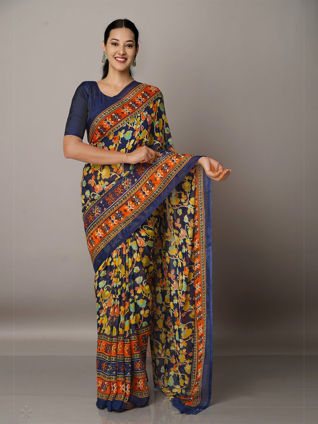 

Unnati Silks Navy Blue & Yellow Floral Block Print Saree