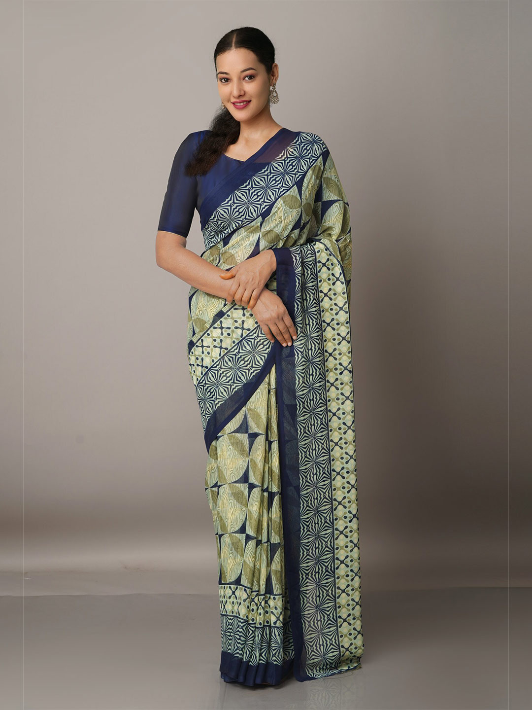 

Unnati Silks Green & Blue Ethnic Motifs Block Print Saree