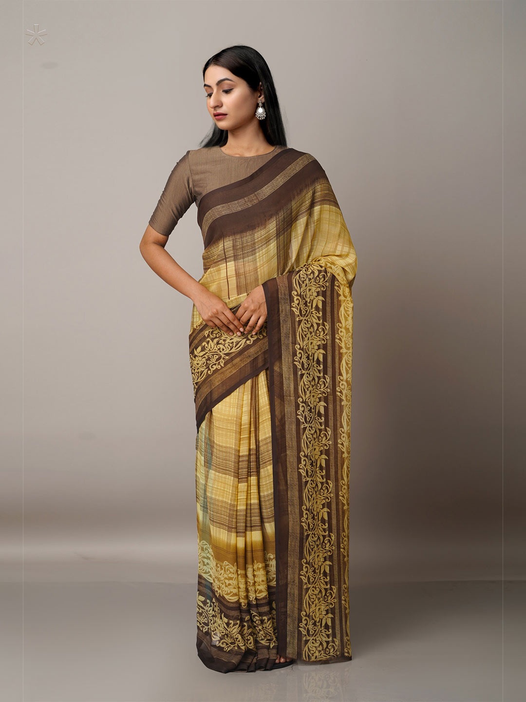 

Unnati Silks Yellow & Brown Ethnic Motifs Block Print Saree
