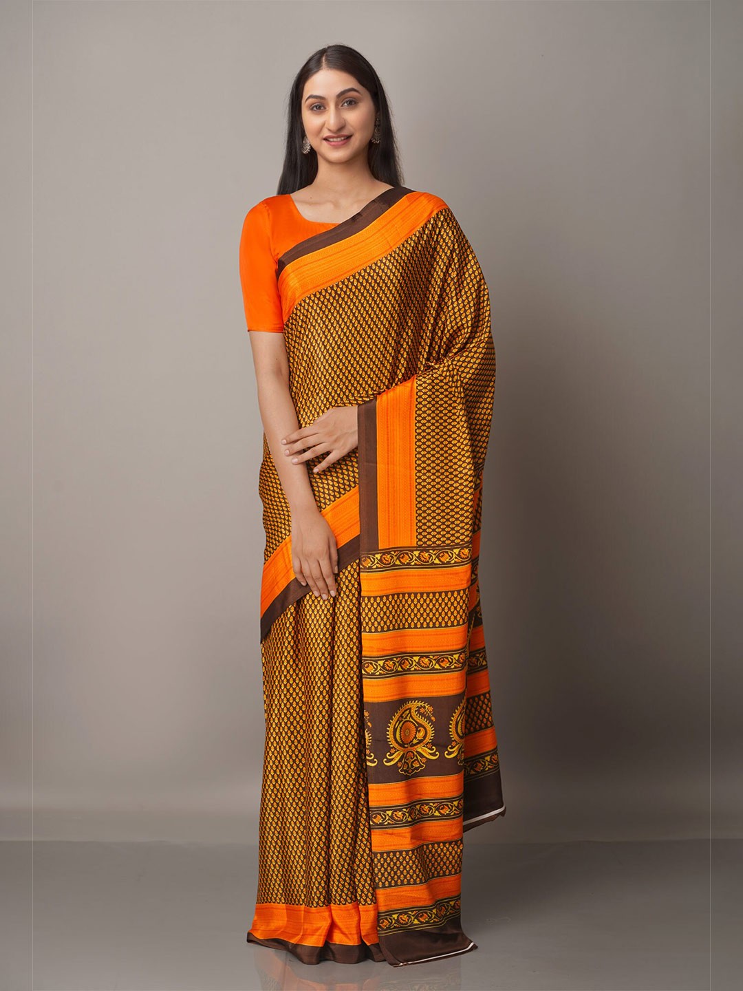 

Unnati Silks Black & Orange Ethnic Motifs Block Print Saree