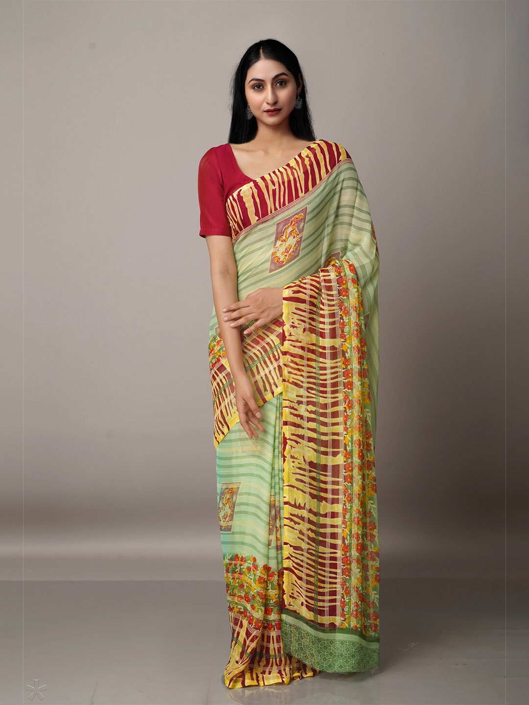 

Unnati Silks Green & Maroon Ethnic Motifs Print Saree