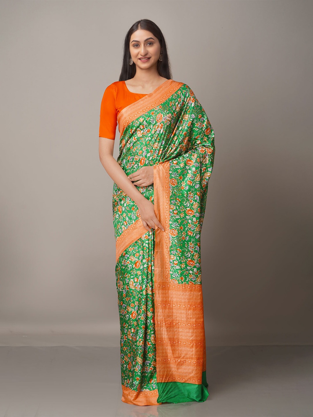 

Unnati Silks Green & Orange Floral Silk Blend Ikat Saree