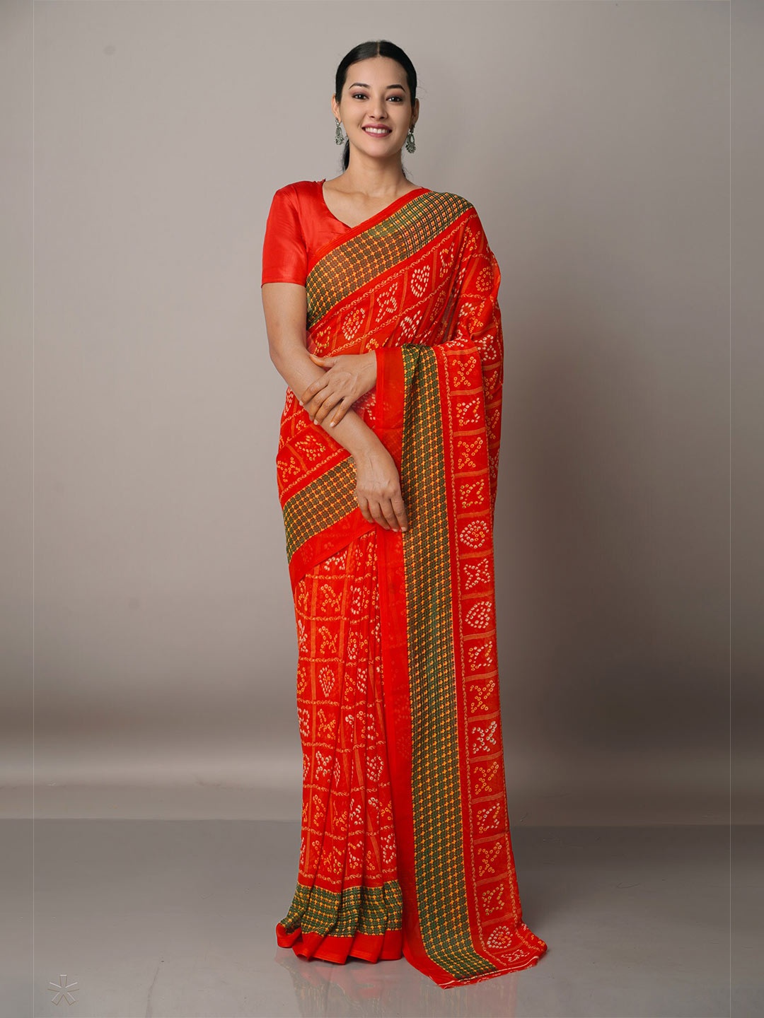 

Unnati Silks Red & Off White Bandhani Saree