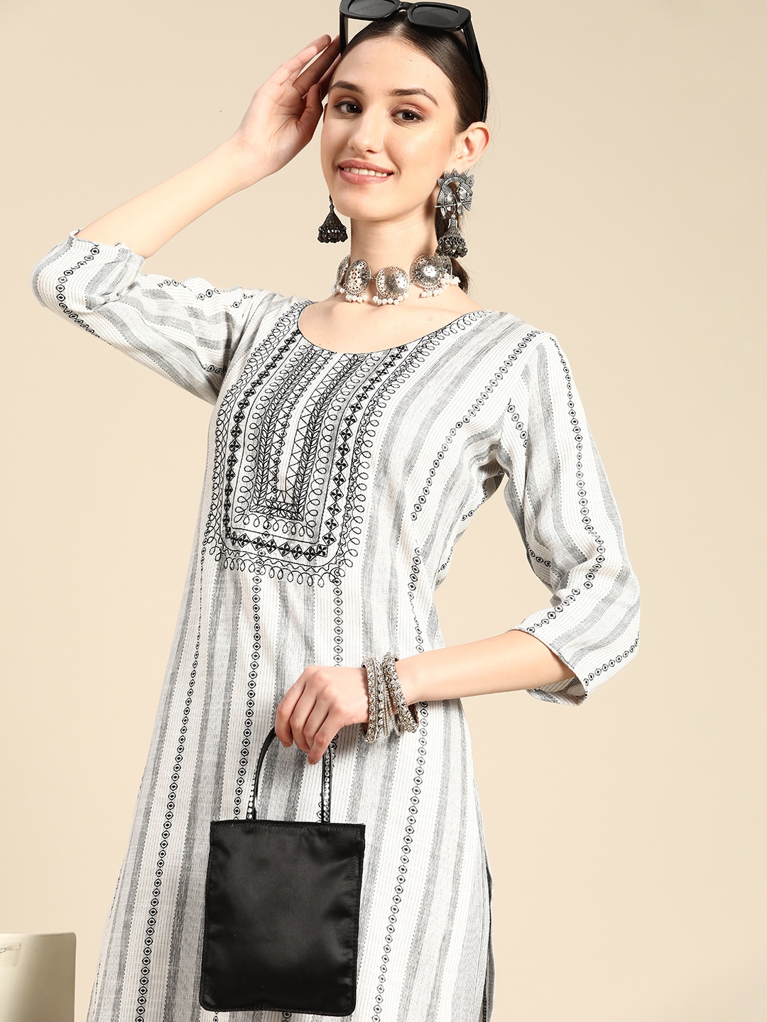 

Sangria Women White & Black Striped Thread Work Kurta with Palazzos