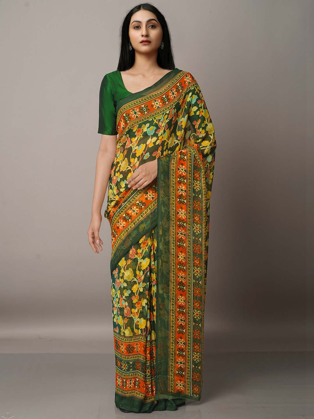 

Unnati Silks Green & Orange Floral Block Print Saree