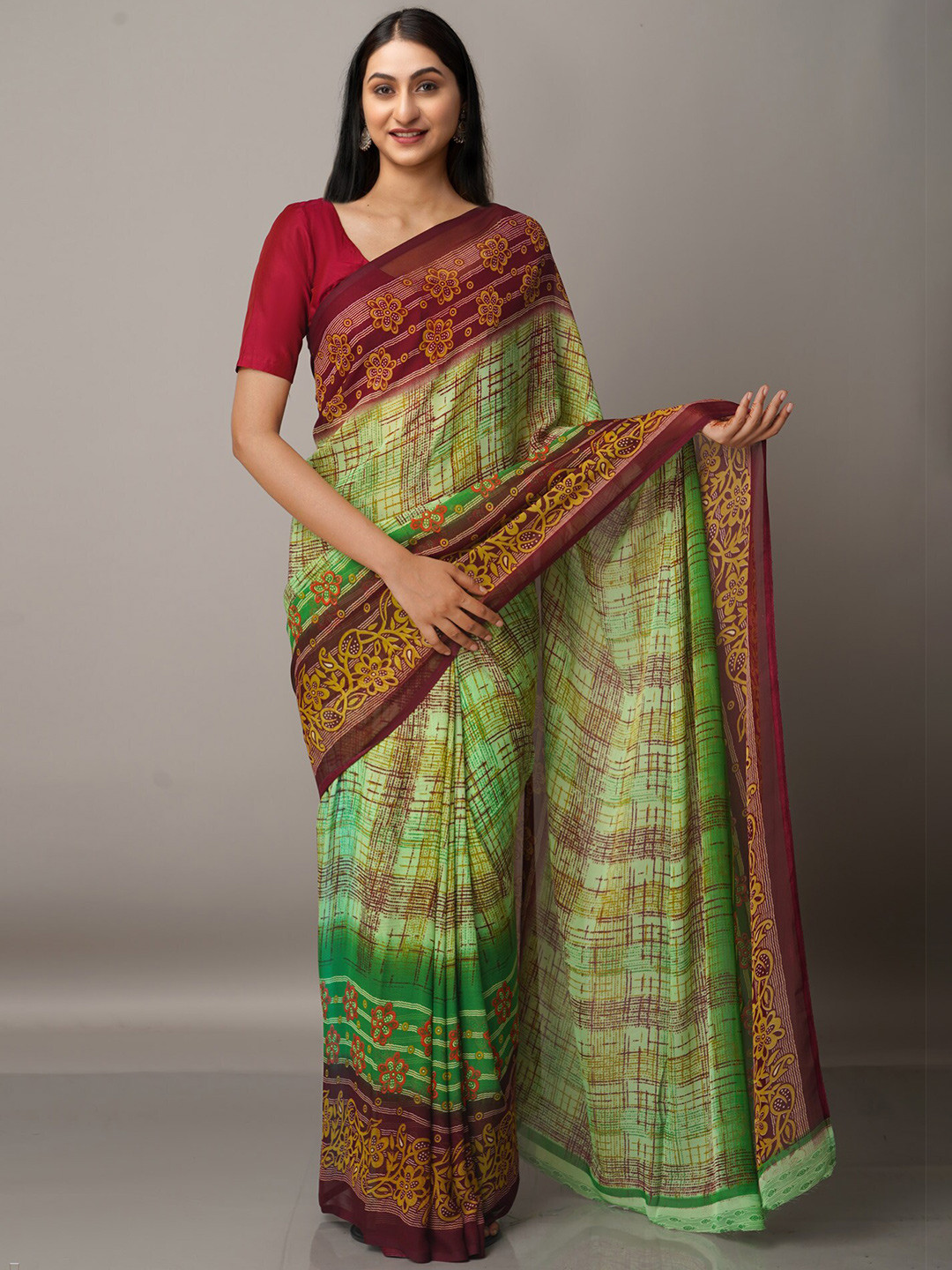 

Unnati Silks Green & Maroon Block Print Saree