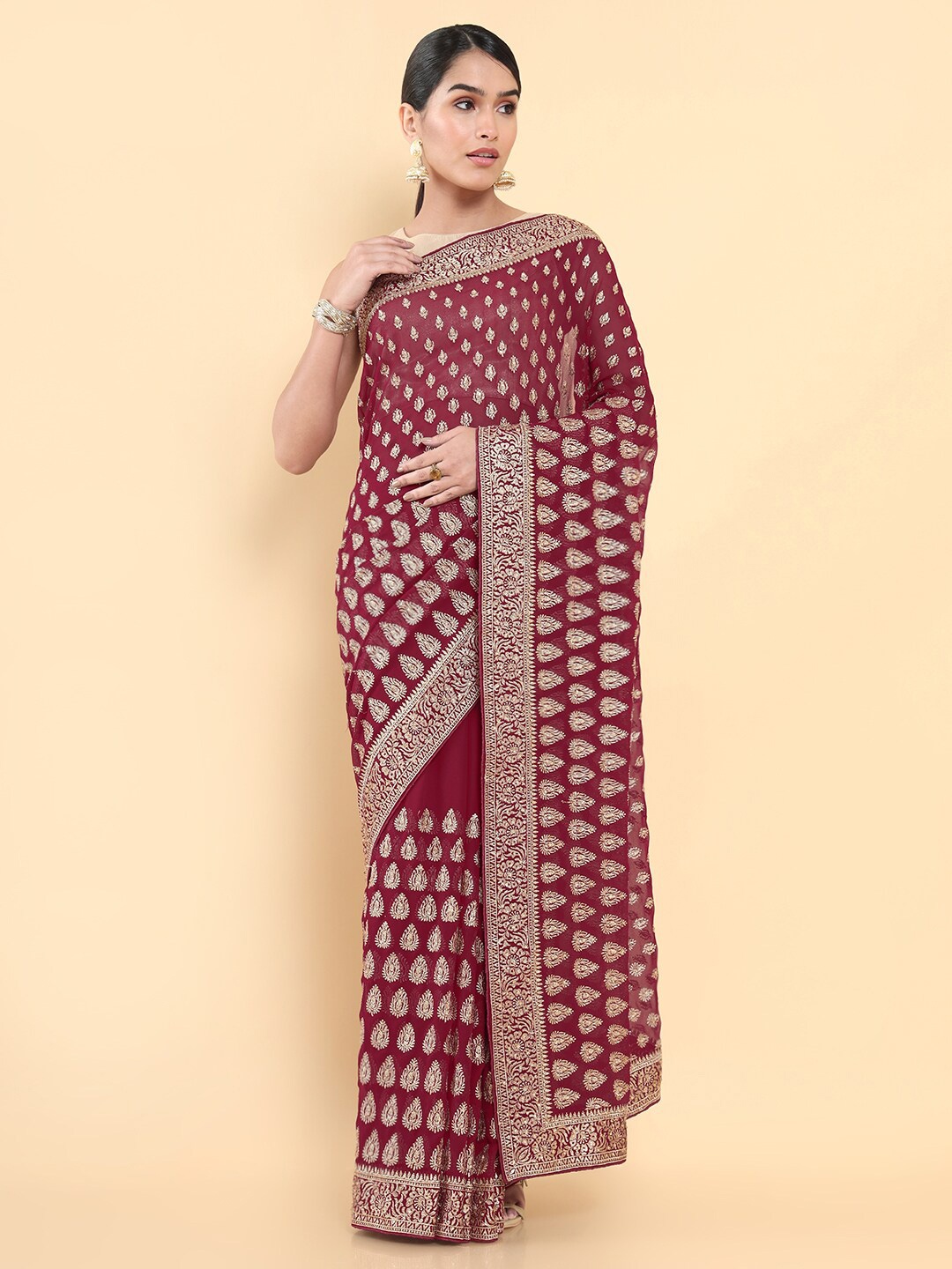 

Soch Maroon Ethnic Motifs Embroidered Saree
