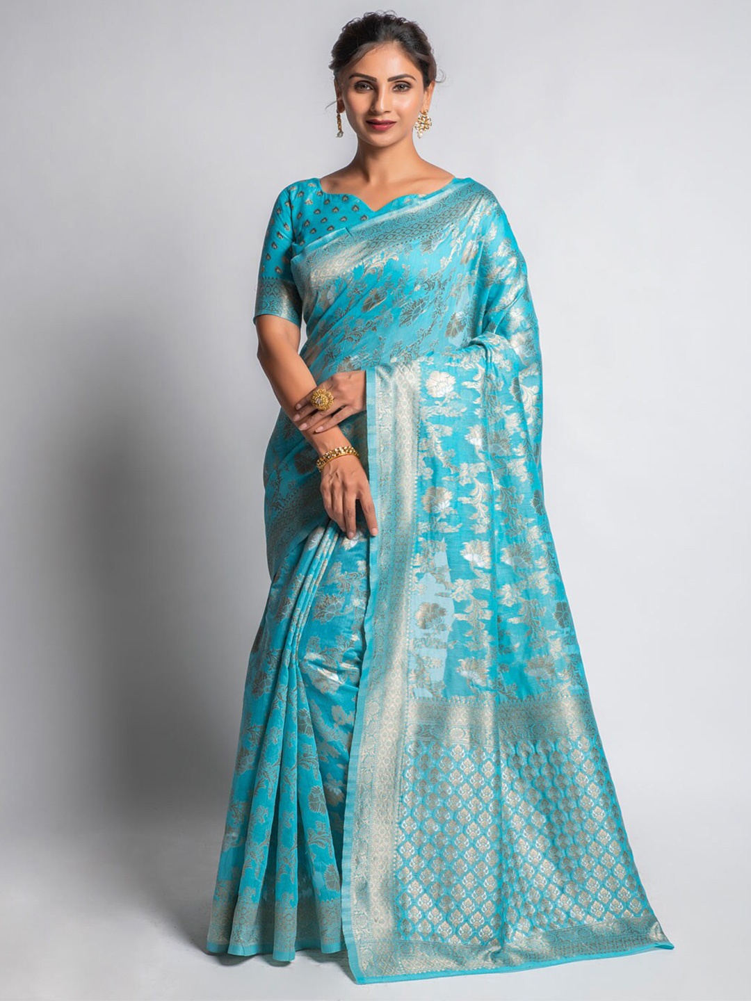

Lilots Blue & Gold-Toned Ethnic Motifs Jacquard Zari Saree