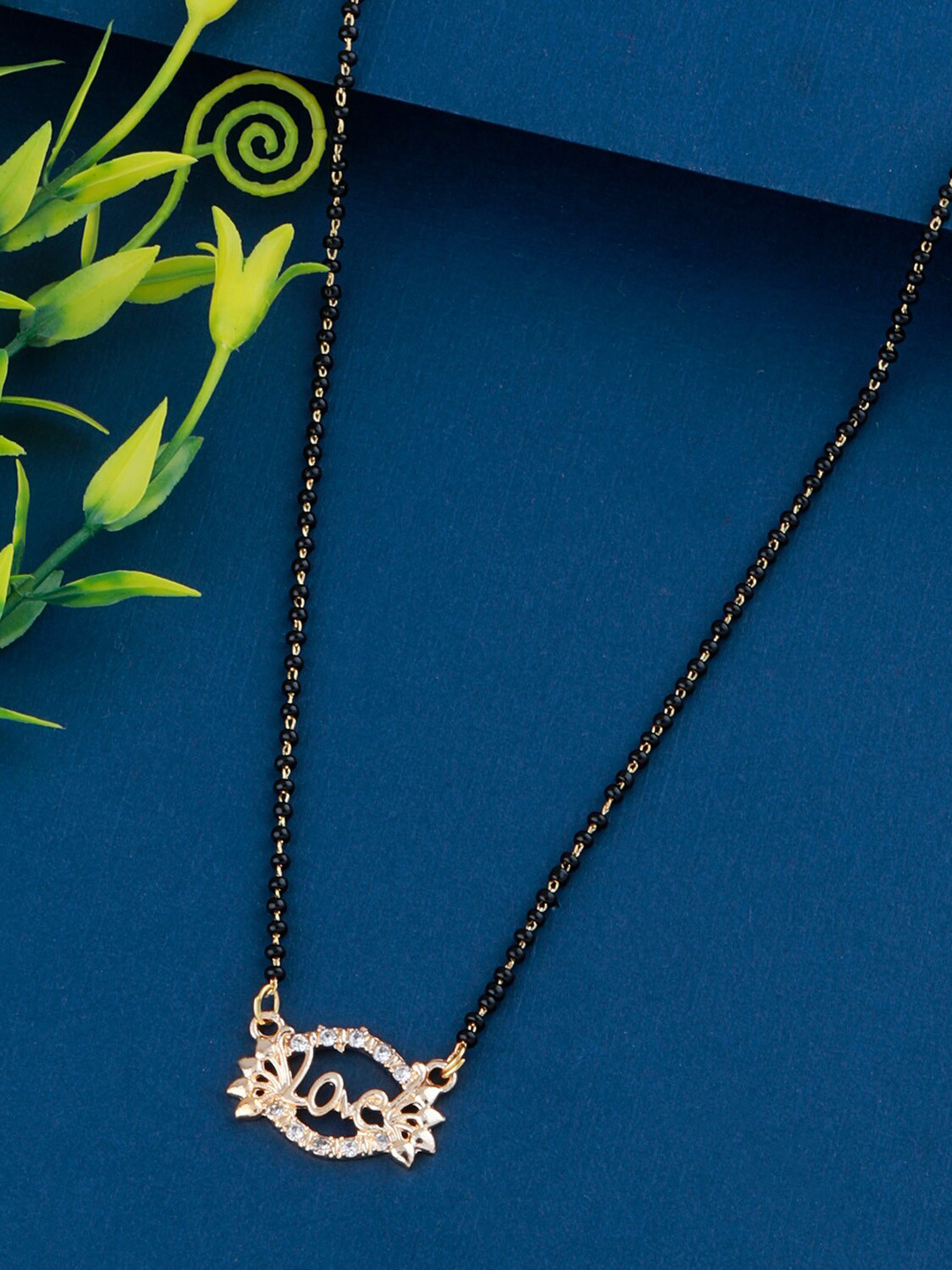 

Silver Shine Gold-Plated Stone Studded & Beaded Love Alphabet Pendant Mangalsutra