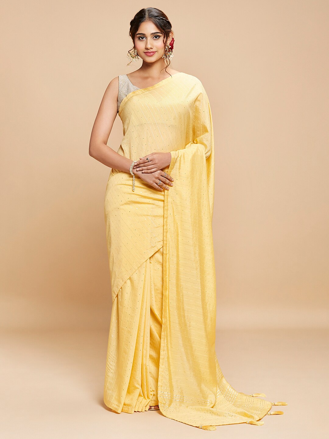 

navyasa by liva Brown Embellished Saree