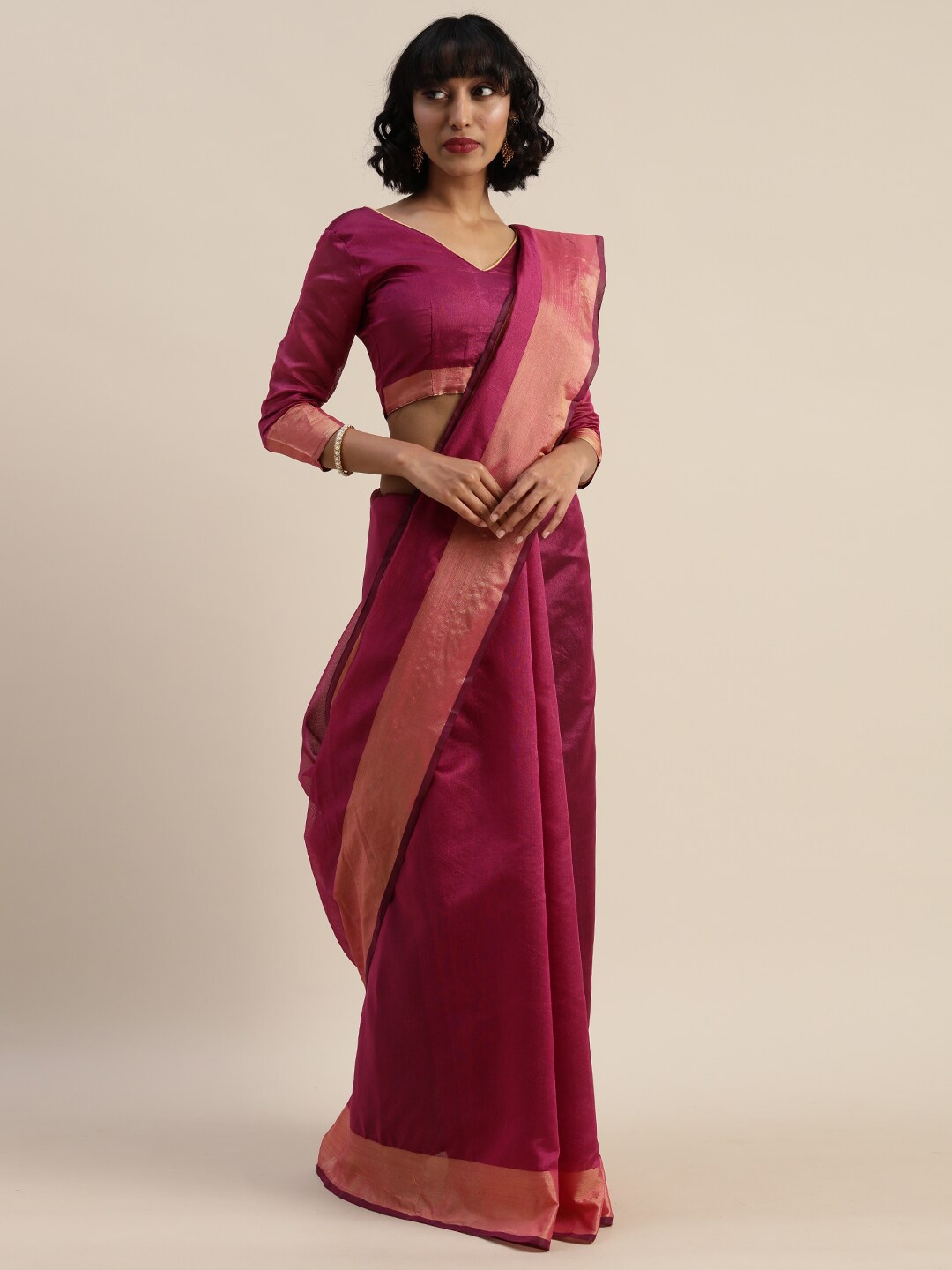 

SAADHVI Magenta & Gold-Toned Zari Border Solid Saree