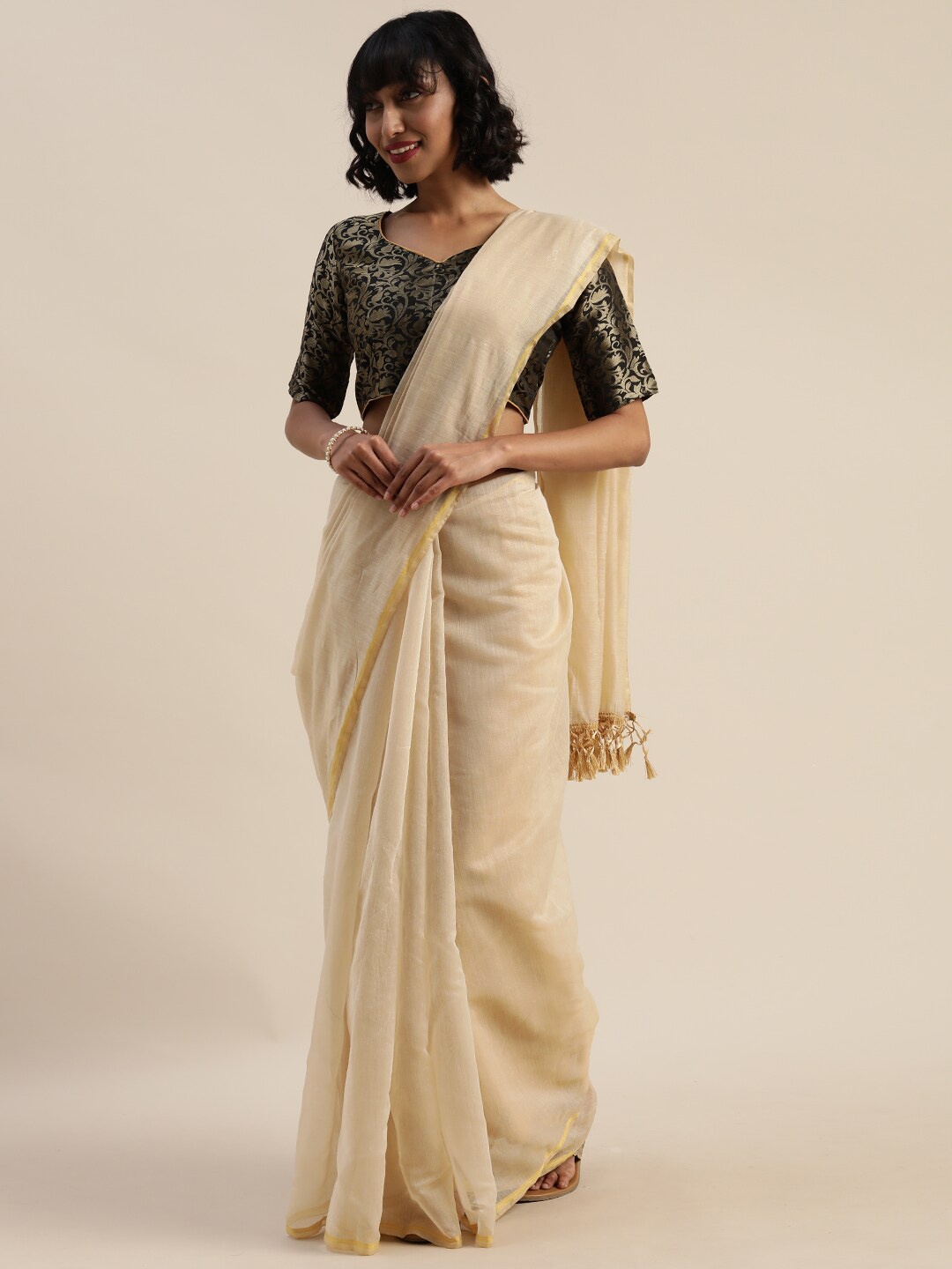 

SAADHVI Beige & Gold-Toned Zari Silk Cotton Saree
