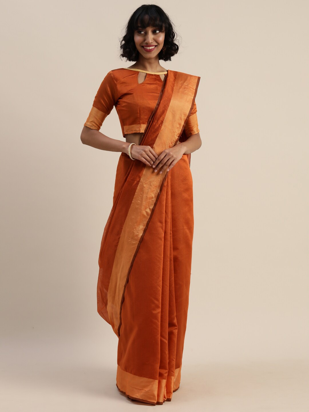 

SAADHVI Yellow & Gold-Toned Zari Art Silk Saree, Rust