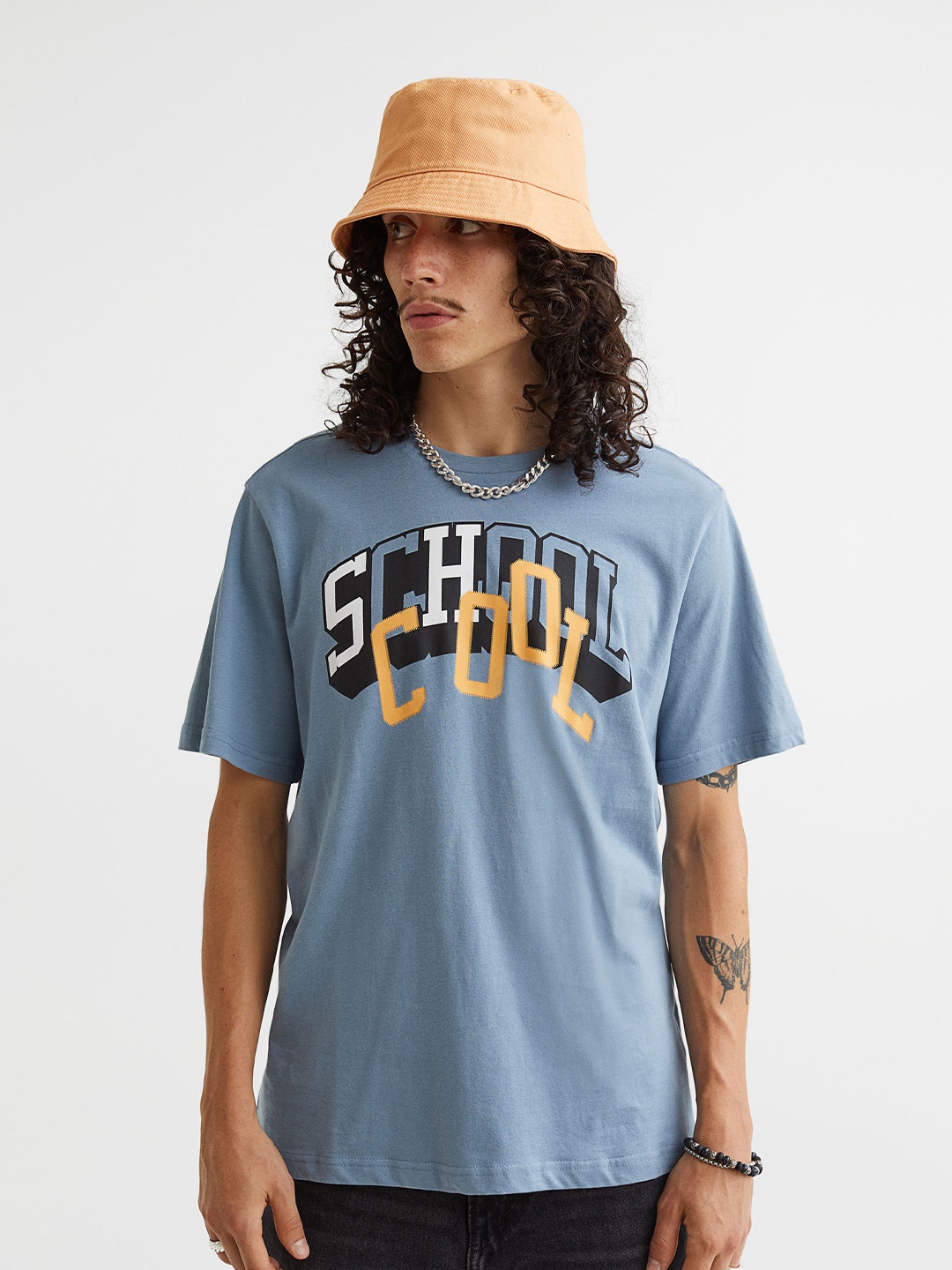 

H&M Men Regular Fit Printed T-shirt, Blue