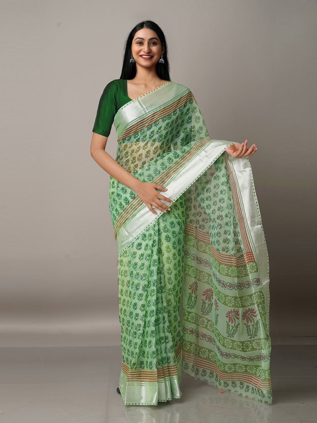 

Unnati Silks Green & Silver-Toned Floral Zari Pure Cotton Kota Saree