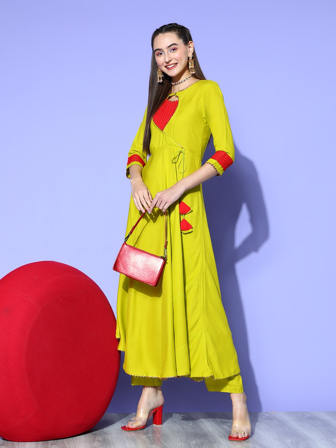 

InWeave Women Colourblocked Viscose Rayon New Neckline Kurta Set, Lime green