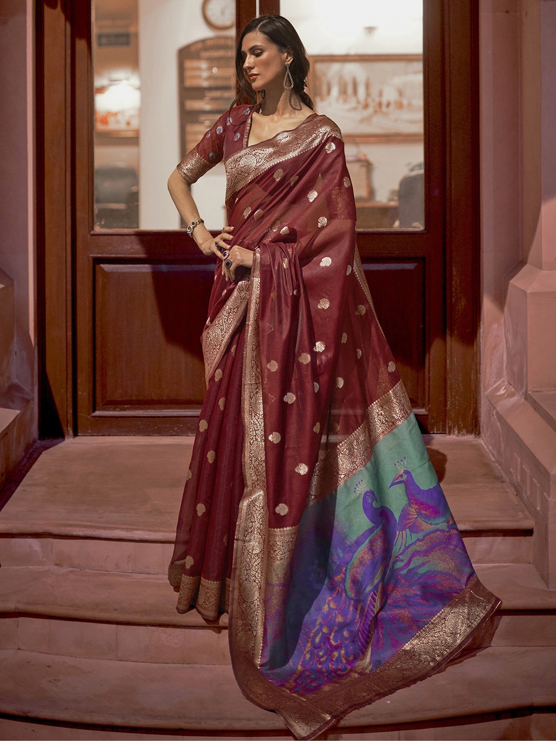 

Mitera Brown & Purple Ethnic Motifs Zari Silk Blend Banarasi Saree