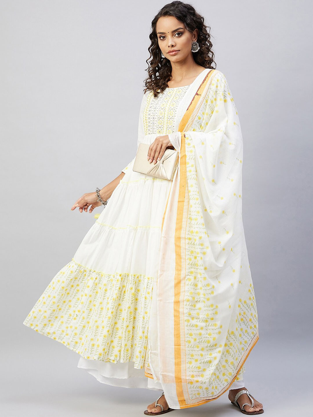 

InWeave Women Yellow Striped Mirror Work Anarkali Kurta