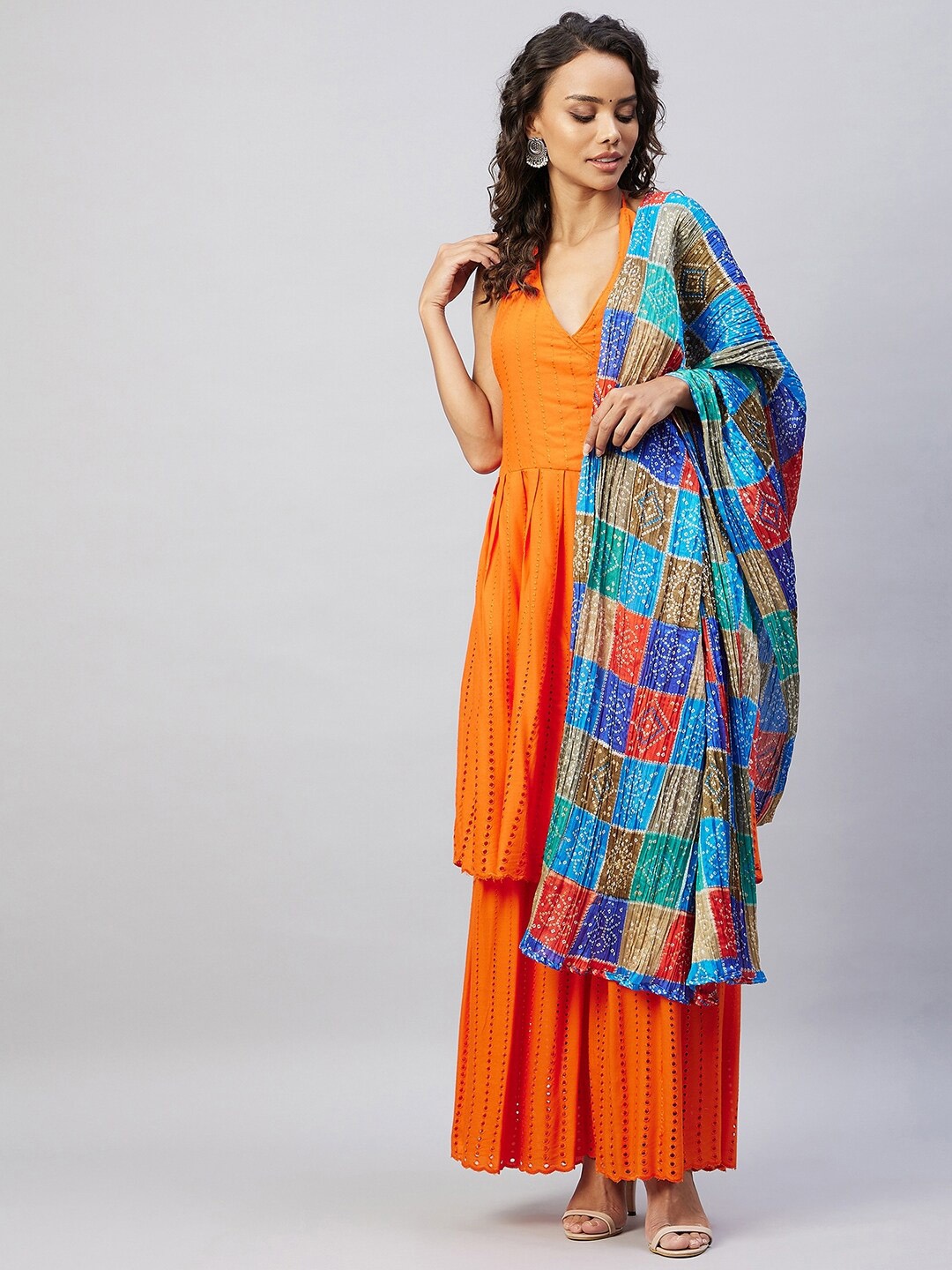 

InWeave Women Orange Embroidered Pleated Kurta with Sharara & Dupatta