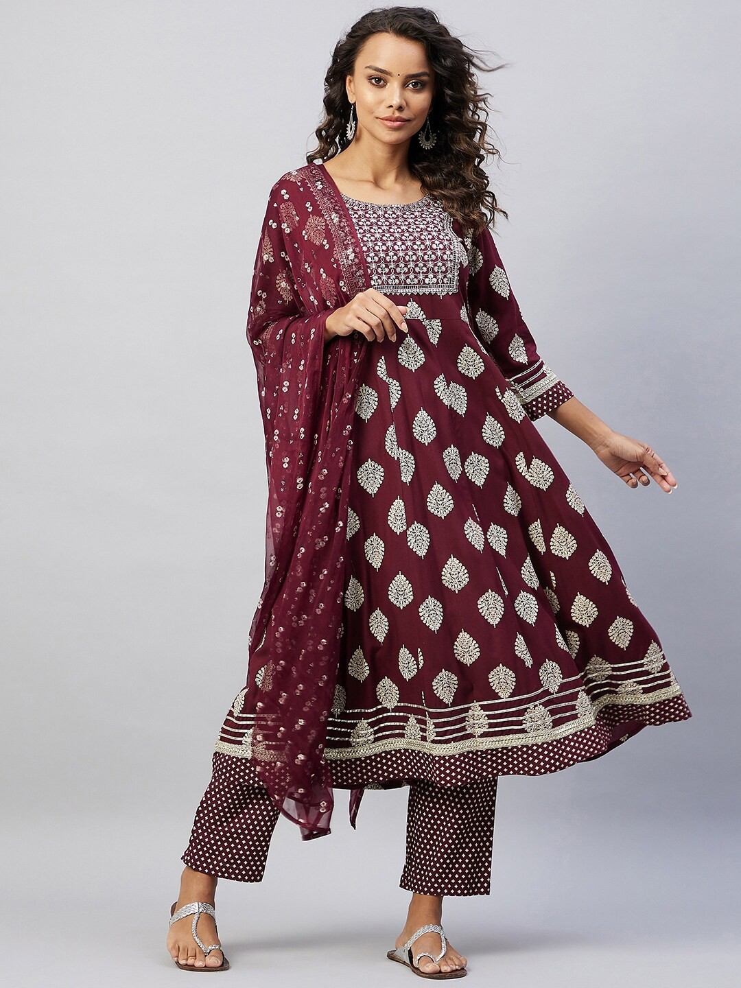 

InWeave Women Burgundy Embroidered Pleated Kurta with Trousers & With Dupatta