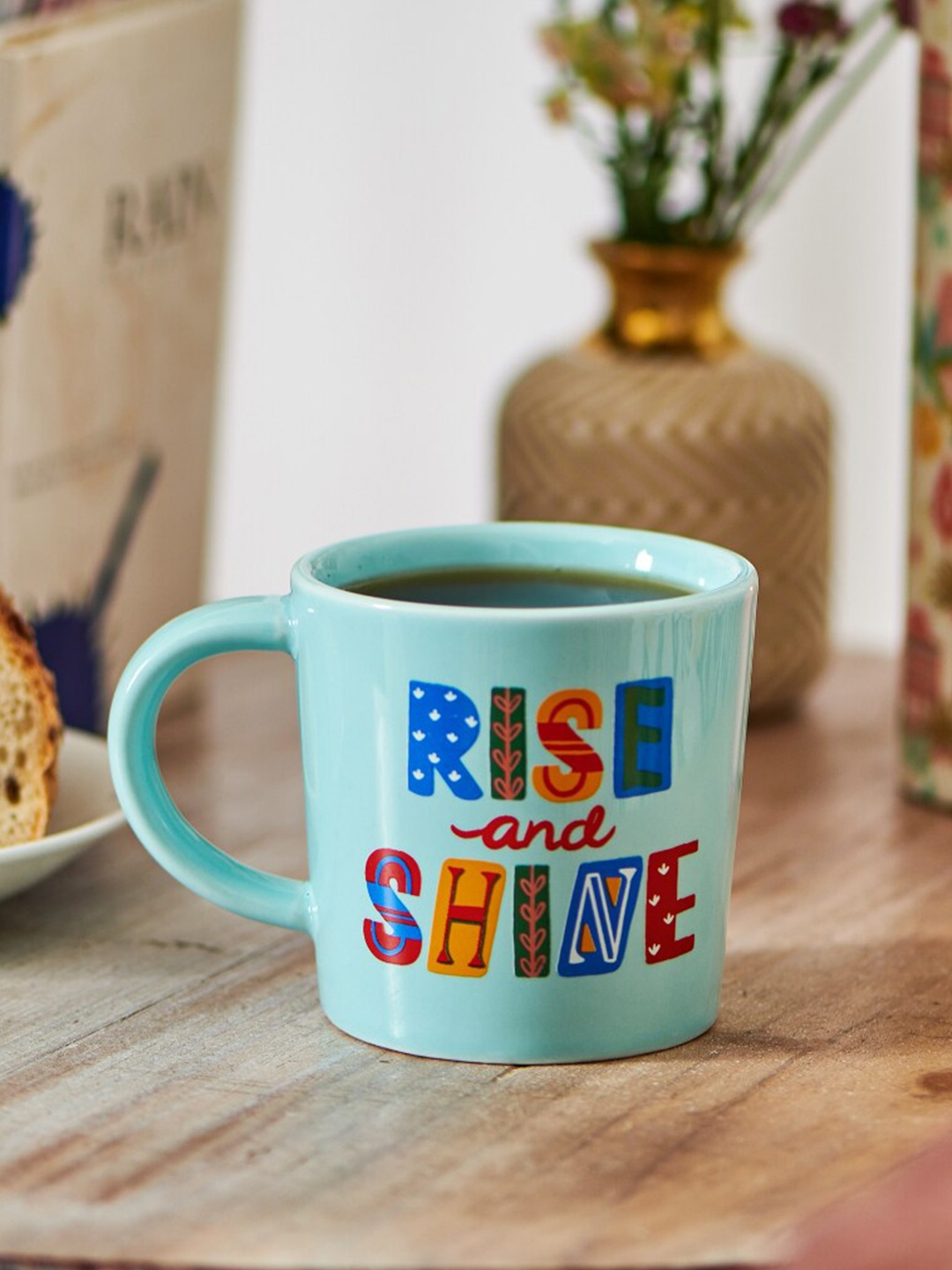 

Chumbak Blue Printed Dishwasher & Microwave safe Ceramic Glossy Mug 300ml