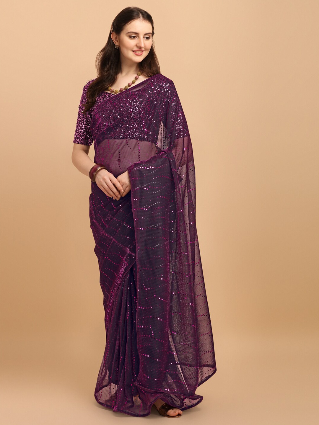 

Fab Dadu Pink Embellished Sequinned Net Saree