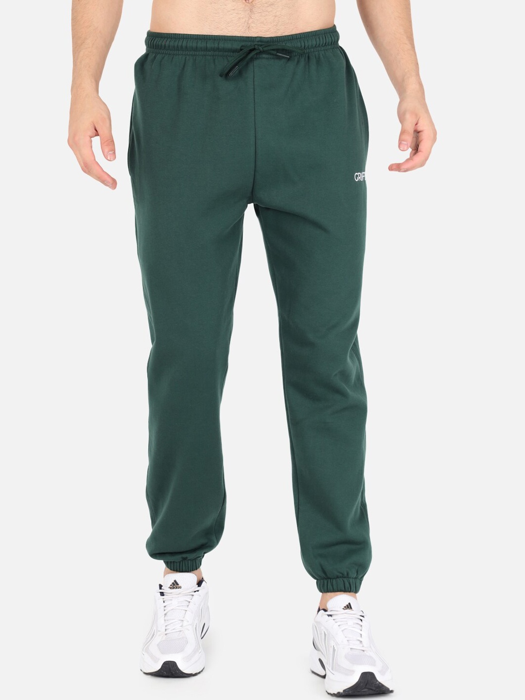 

GRIFFEL Men Regular Fit Solid Joggers, Green