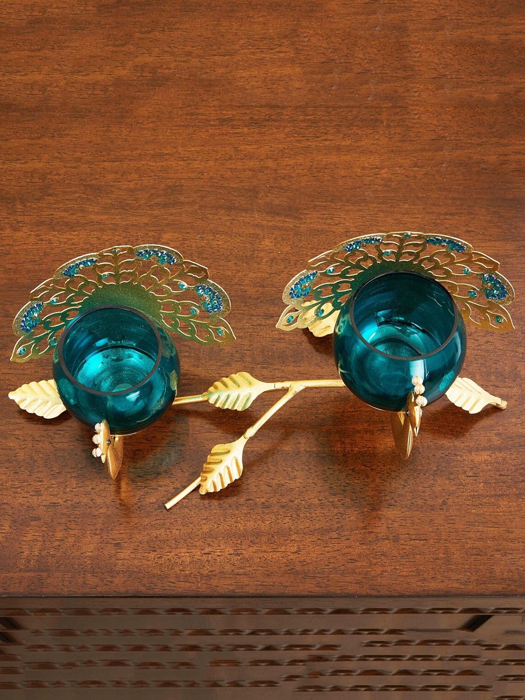 

Home Centre Gold-Toned Peacock Glass Candle Holders