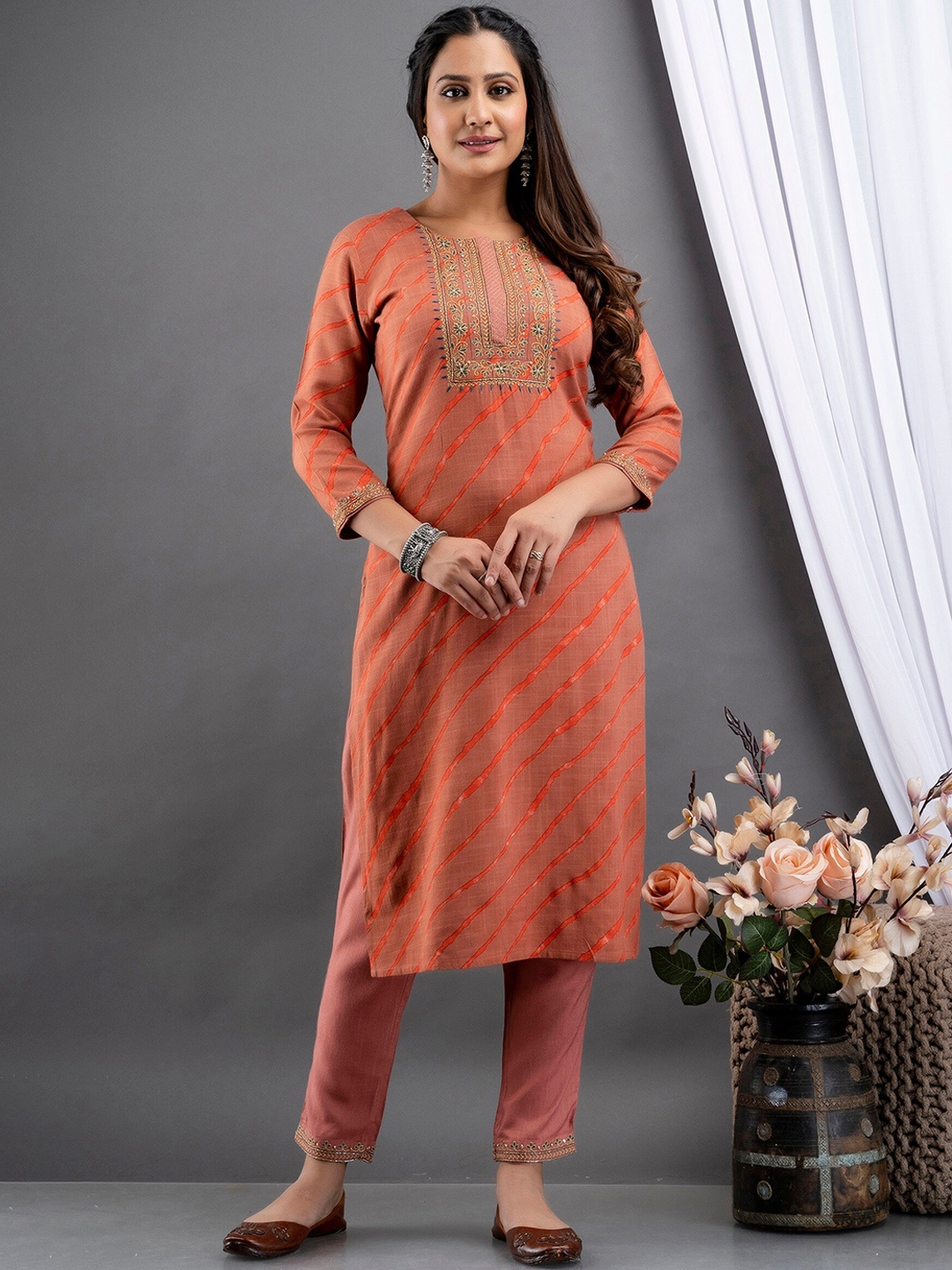 

SUTI Women Orange Leheriya Embroidered Kurta with Trousers