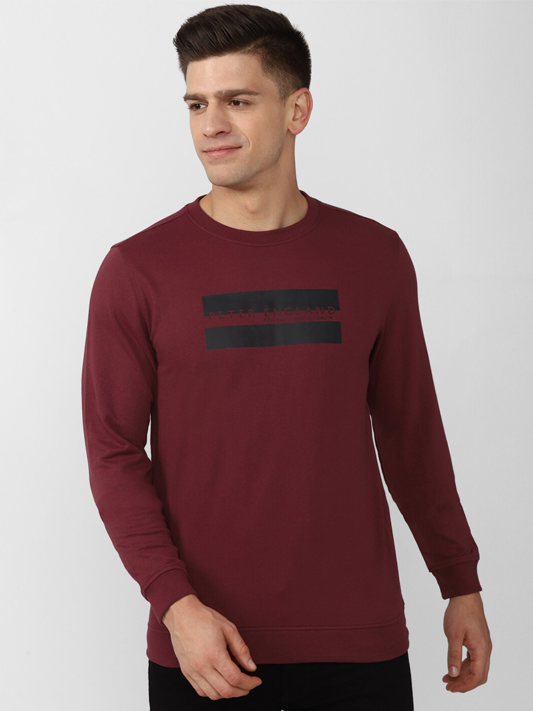 

Peter England Casuals Men Brand Logo Printed Sweatshirt, Maroon