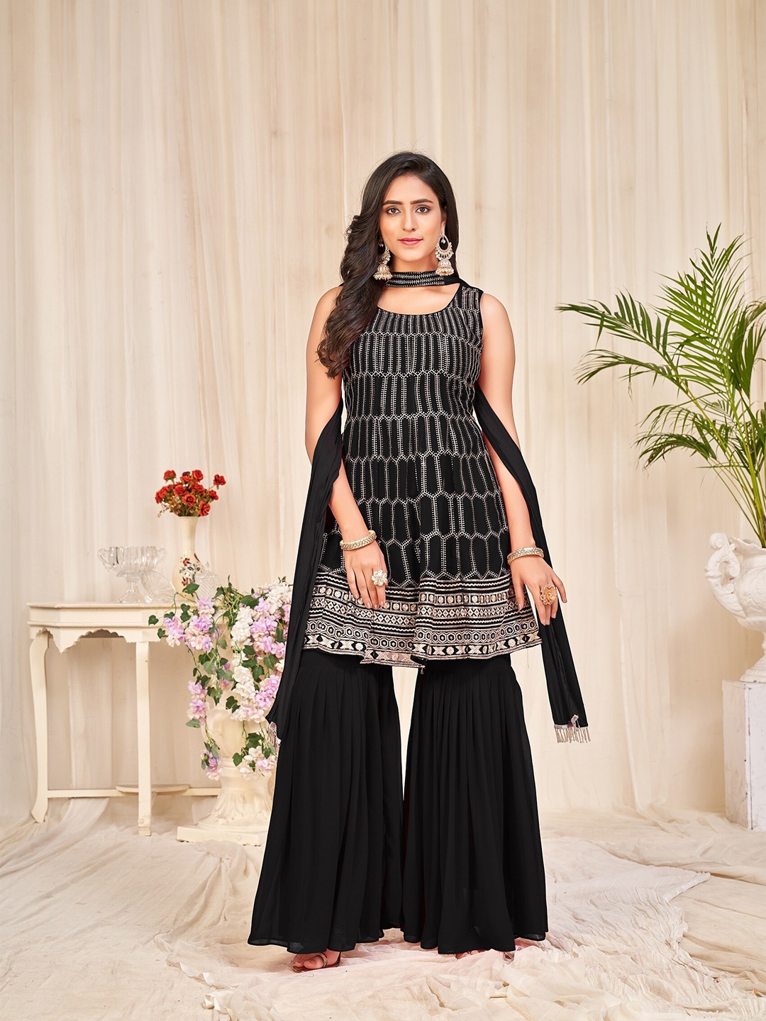 

Atsevam Women Embroidered Semi-Stitched Dress Material, Black