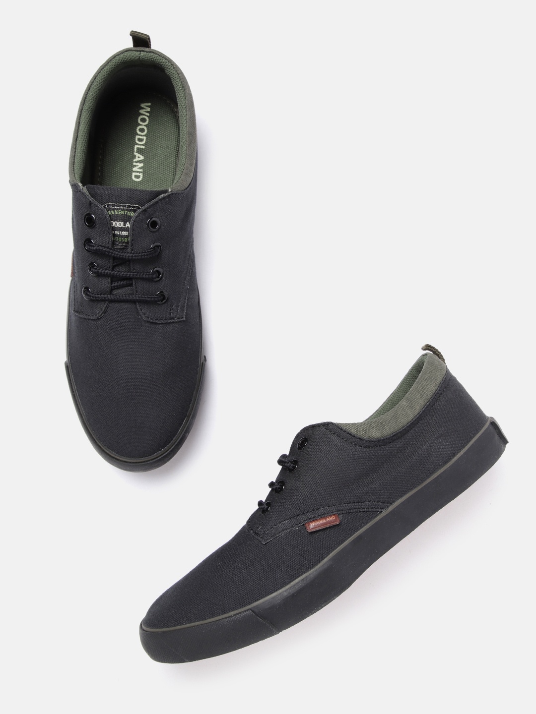 

Woodland Men Black Solid Derbys