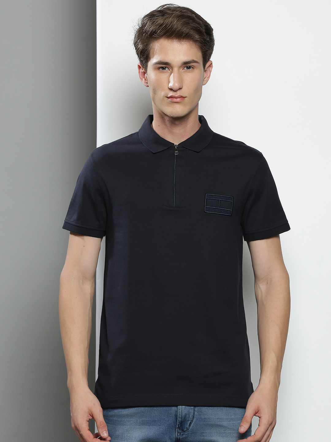 

Tommy Hilfiger Men Navy Blue Solid Polo Collar Pure Cotton Slim Fit T-shirt